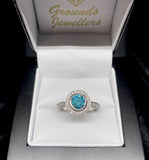 18ct White Gold Blue Diamond Halo Ring