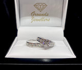4 Claw Brilliant Cut Diamond Ring with Princess Cut Diamond Shoulders