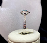 18ct White Gold Blue Diamond Halo Ring